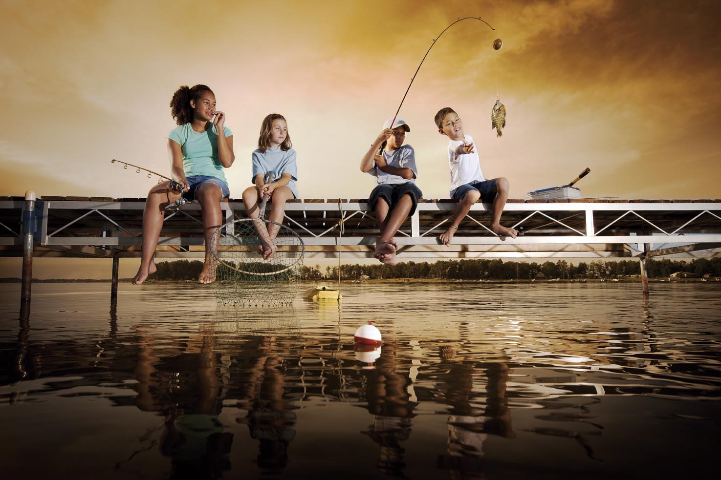kids fishing off dock
