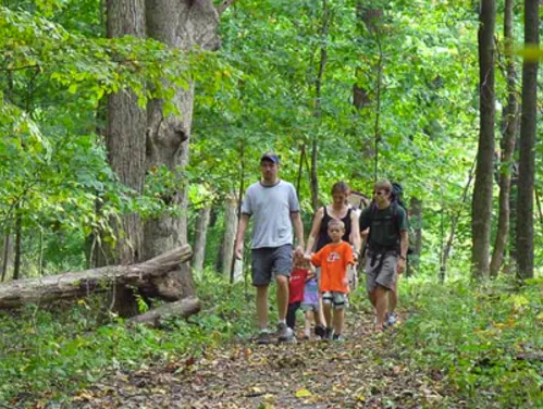 A family hikes through an Iowa state park
