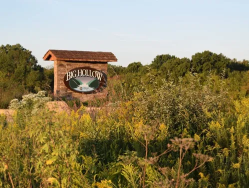 This image shows a sign of Big Hollow Recreation Area in Des Moines County.
