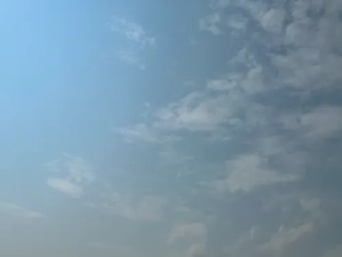 This image shows hazy skies over Iowa due to wildfires in northwest Canada