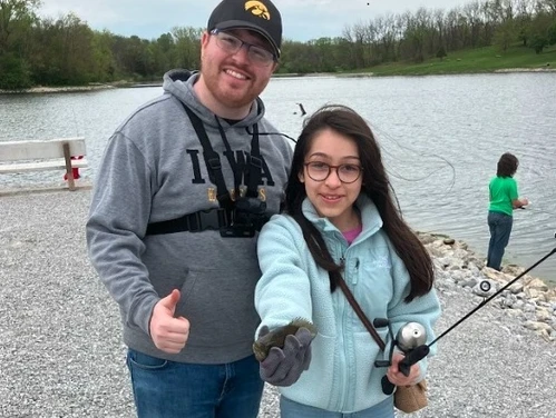 A man and a girl fishing
