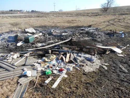 This image show open burning of household waste in a rural area