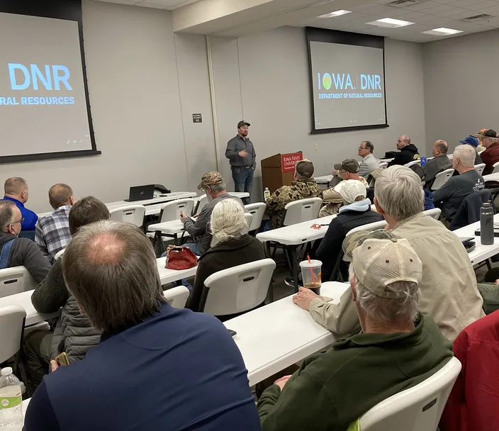 Wildlife staff presenting at a public listening session