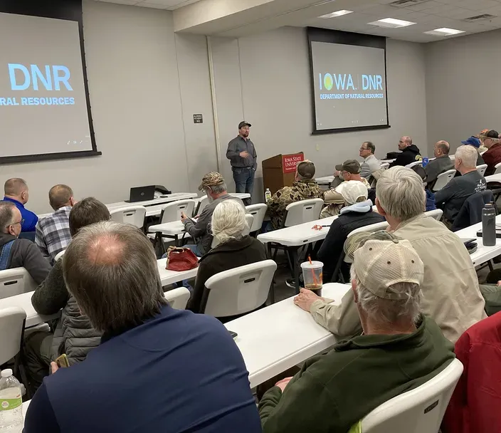 Wildlife staff presenting at a public listening session
