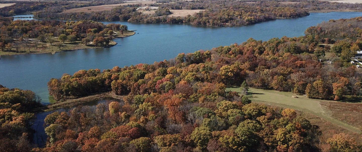 Lake Darling surrounded by fall foliage.