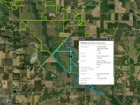 Screenshot showing Iowa and different public hunting areas outlined, then with popup information. 