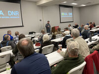 Wildlife staff presenting at a public listening session
