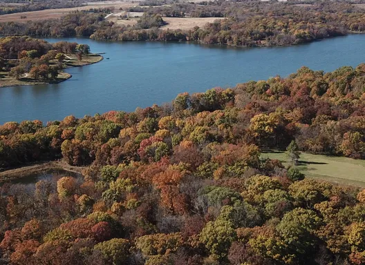 Lake Darling surrounded by fall foliage.