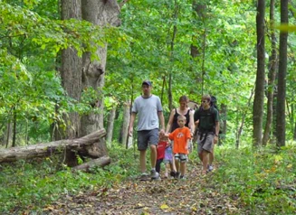 A family hikes through an Iowa state park