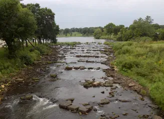 Watershed improvement project, overflow water running over rocks.