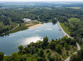 This image shows a drone shot above Kent Park Lake in 2025