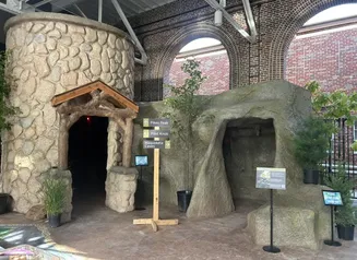 Interactive state parks themed playscape in the DNR building at the Iowa State Fair