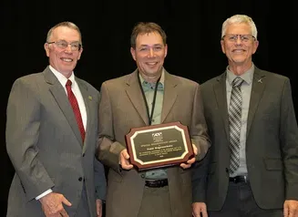 Todd Bogenschutz  receiving a special recognition award from The Association of Fish & Wildlife Agencies