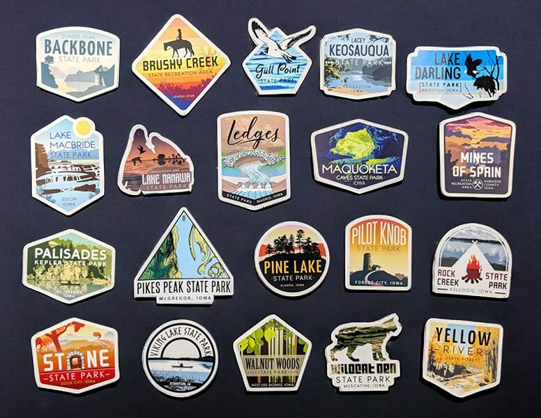 A sticker collection of Iowa's state park stickers
