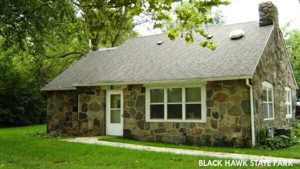 A deluxe family cabin, made of stone, at Black Hawk State Park