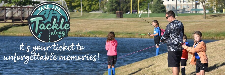 A man a kids fishing at a community fishing pond